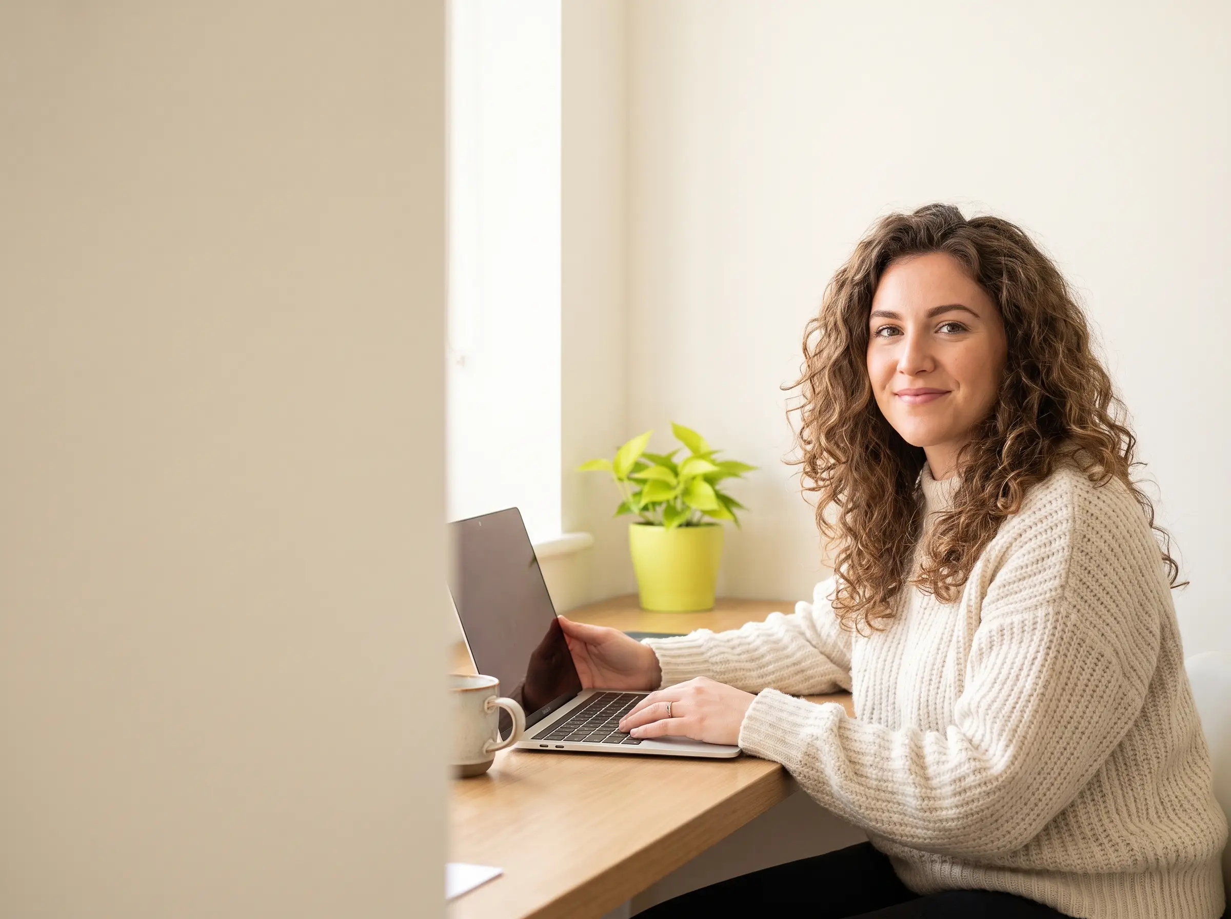 A marketing manager at her desk, the month's strategy just in